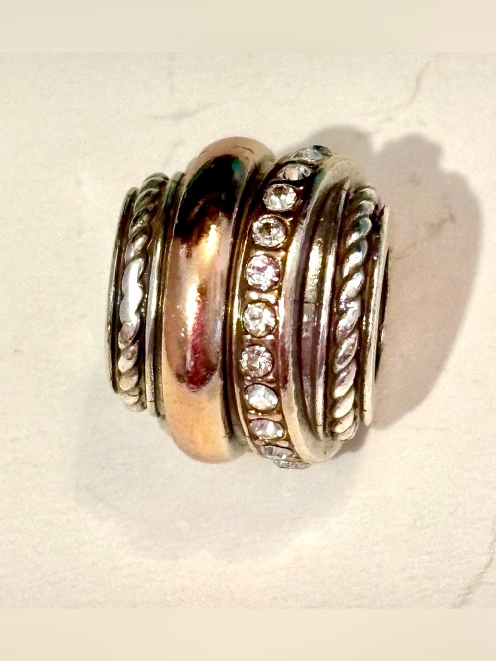 Brighton Neptune’s Ring bead Rings of silver, gold, & clear crystals Retired